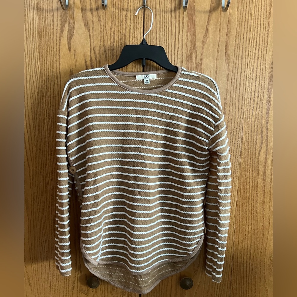 Tan sweater with white roped detail and button details sides